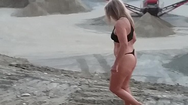 Granny walking outside in a string tanga!