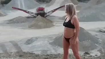 Granny walking outside in a string tanga!