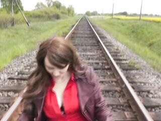 Undressed in public. Woman out of pants positions near teach. Piddle public. Outdoor