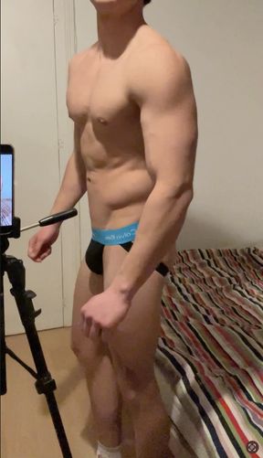 Young muscle hunk flexing in a jockstrap