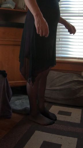 T-girl in Cute Minidress Dances Takes off Pantyhose and Teases