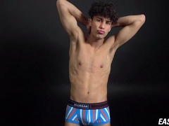 Curly twink boy shows off his slim body on webcam