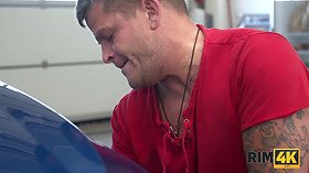 Well-rounded hottie tastes asshole of tires car mechanic