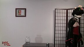 The latex concubine performs the Japanese Tea Ceremony