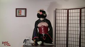 The latex concubine performs the Japanese Tea Ceremony
