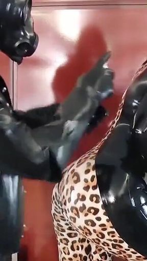 Latex Rubber Petting- Curvy MILF and Her Submissive Guy - Polishing Oiling and Petting in the Plane