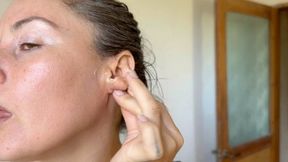 cleaning dirty sexy ears with a cotton swab and coconut oil