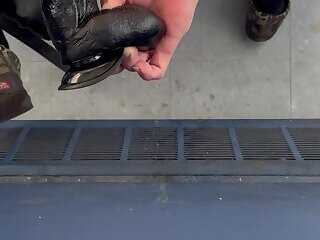 Wall riding a fat dildo in fishnets