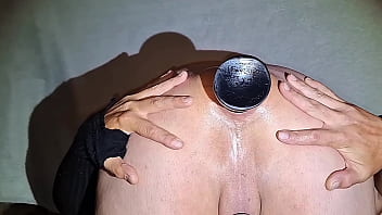 Anal gaping with huge plugs