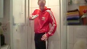 Fully dressed in adidas shower