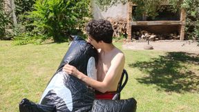 Beautiful Man Inflates His Inflatable Whale Near Pool Outside