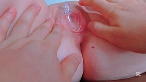 taking a sample of her pussy fluids using a spoon