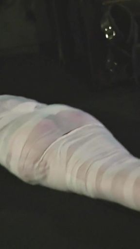 Barefoot Astrid Gets Mummified with White Bandages and Gagged Tightly