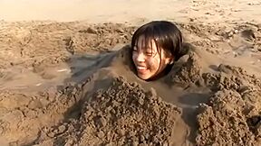 Girl Buried In Beach
