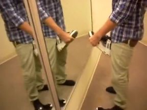 Playing with DVS in fitting room and cum