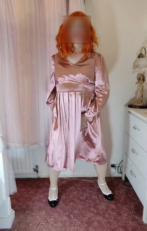 Crossdresser in vintage satin dress