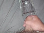 Solo masturbation cumshot into glass cup