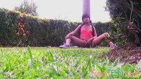 Tobie Teen Fingering her tight pussy at garden