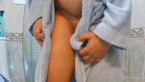 After showering I dry myself and put on a thong.