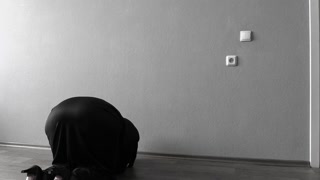 The nun is a mature bbw with big saggy tits.