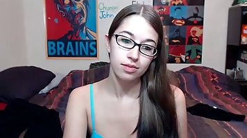 Skinny teen brunette with glasses, Alexxx Coal is playing with herself in front of the web camera