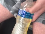 Friend took a piss in a bottle in car.