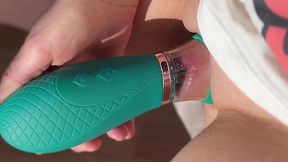 Skinny brunette is playing with her pussy with a dangerous suction toy