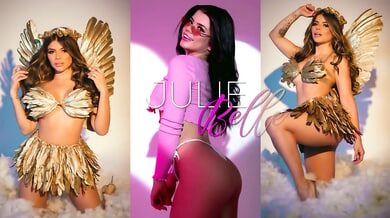 Yuli Belle teases in feathers then shifts to black leather for a passionate solo dance
