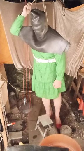 Green housewife with rubber head