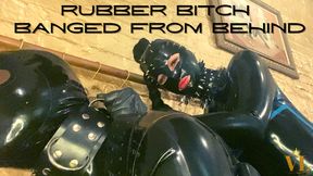 RUBBER BITCH GETS BANGED FROM BEHIND