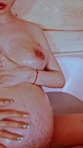 Bath with Foam for Pregnant Blonde with Big Boobs