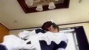 Pretty Asian maid, Natsumi exposes hot pussy for finger