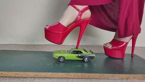 Giantess Lily Kink First toy car crush of a Plymouth Barracuda in big red high heels Close ground view