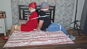 Couple bondage on the bed