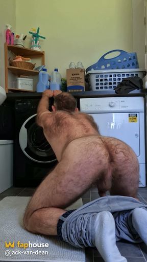 Hairy Bear Doing Laundry