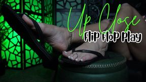 “Upclose Flip Flop Play" [DANGLING}