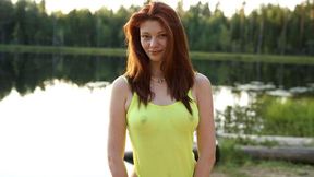 An awesome redhead model Foxy Dreams nicely plays with her snatch