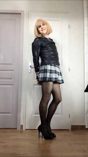 Sexy crossdresser Faustine leather jacket and skirt.