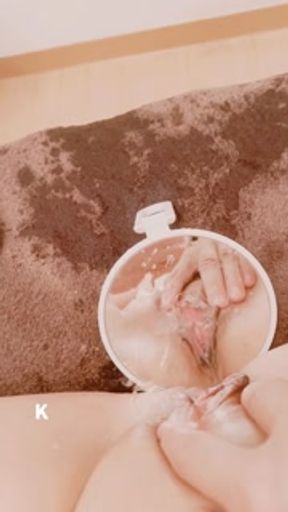 Milf plays with her pussy while observing my tiny clit with a hand mirror and iPhone