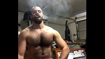 Sexy Hairy Muscle Stud Jerking off in garage while smoking a cigar And Blowing a Huge Load FunMrSmith Bearded Stud