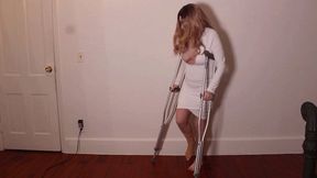 M - Sprained ankle walking with crutches wrapped bandaged foot