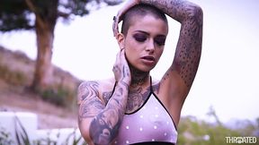 Tattooed skin head Leigh Raven slobbers all over a big hard cock and gets facial