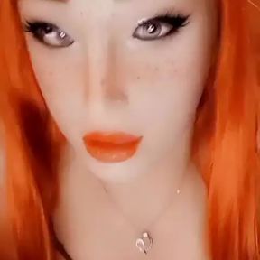 Stroking my strapon while masked as a redhead