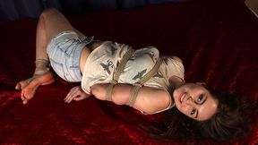 Anita: barefoot girl in tank top and unbuttoned short jeans shorts, hogtied with hemp rope, rolls and wiggles on the bed (HD MP4)