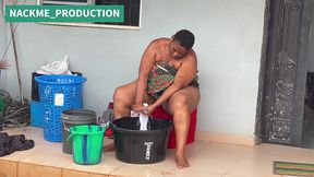 african mama multitasks on a sunday morning