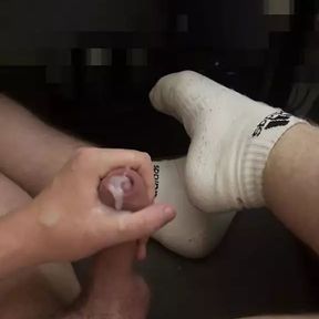 Young horny and tough boy jerks off in white adidas socks and cums.