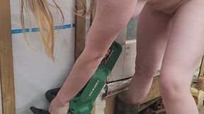 Naked girl using her chainsaw