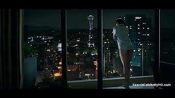 Dakota Johnson and a guy she is in love with are having sex and doing kinky stuff