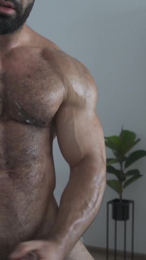 Jaw-dropping moment from "Hairy bodybuilders jerks off and puts cum on chest after flexing - Anthony Beau"