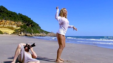 Beautiful babe get all fuck holes penetrated by her photographer on the beach